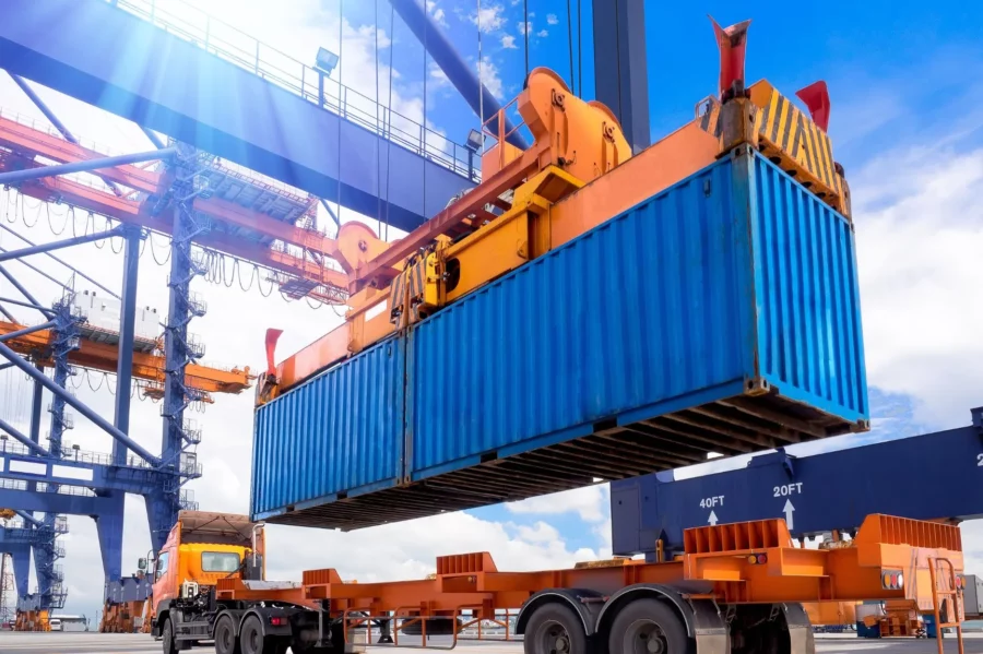 Container being placed on a chasses, ready to be transported to the warehouse for transloading.