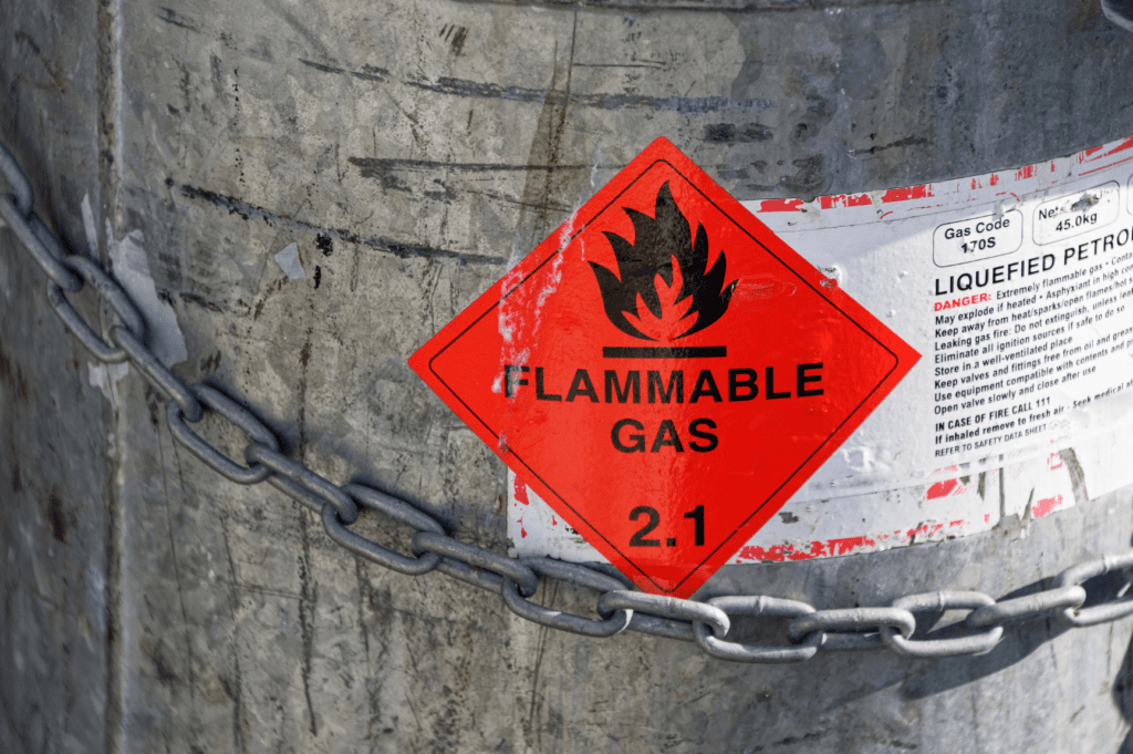 A secure hazardous material warehouse with specialized storage solutions, safety measures, and compliance for handling dangerous goods.