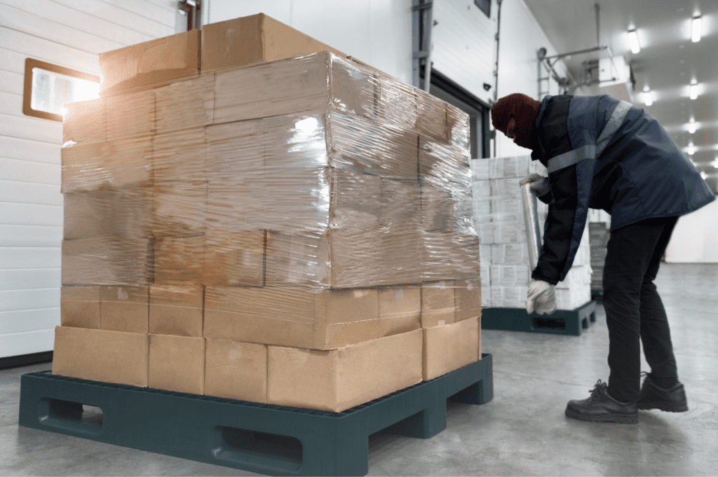 Well-secured pallet wrapped in stretch film after rework and stabilization at OLIMP partner warehouse in Miami.