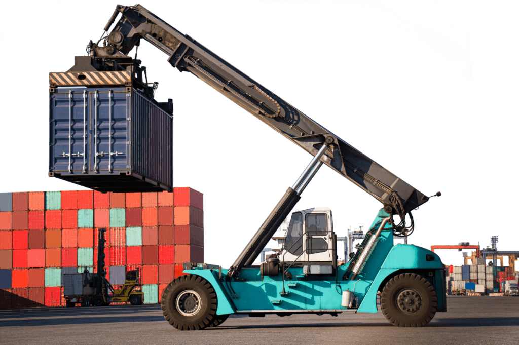 Forklift handling shipping container at Cleveland transloading warehouse near rail and port terminals