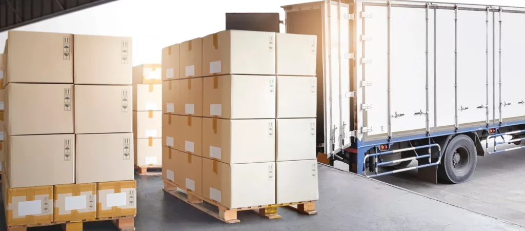 Palletized freight stored at OLIMP Tampa cross dock facility before reloading