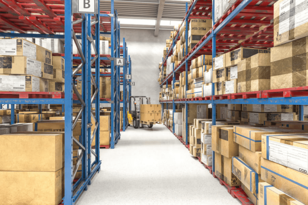 Organized warehouse aisle in Memphis with tall shelves stocked with boxes and inventory ready for distribution.