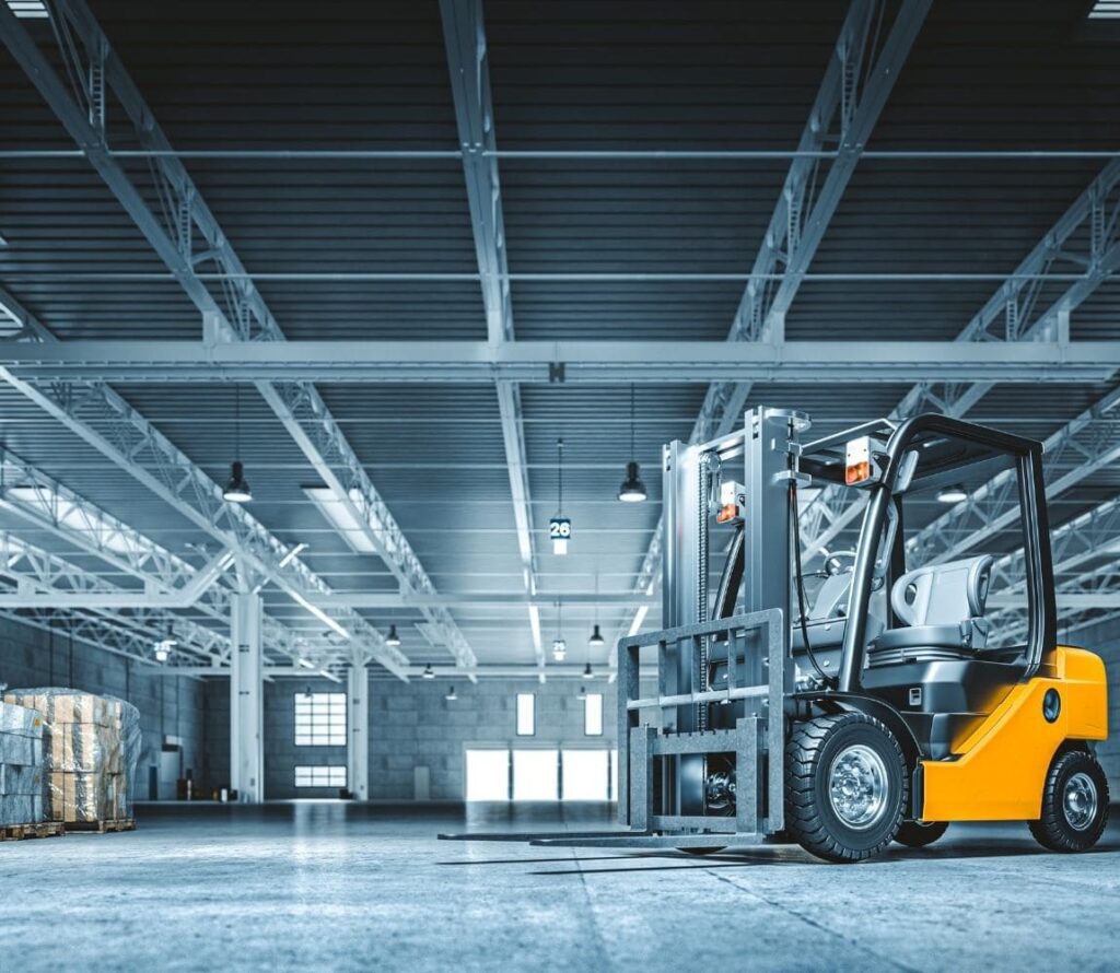 Workers loading freight in warehouse