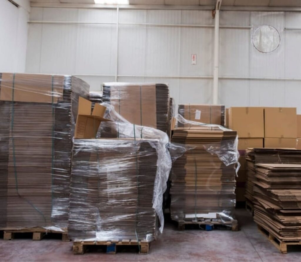 Pallet rework team securing rejected shipment for safe delivery across Ohio