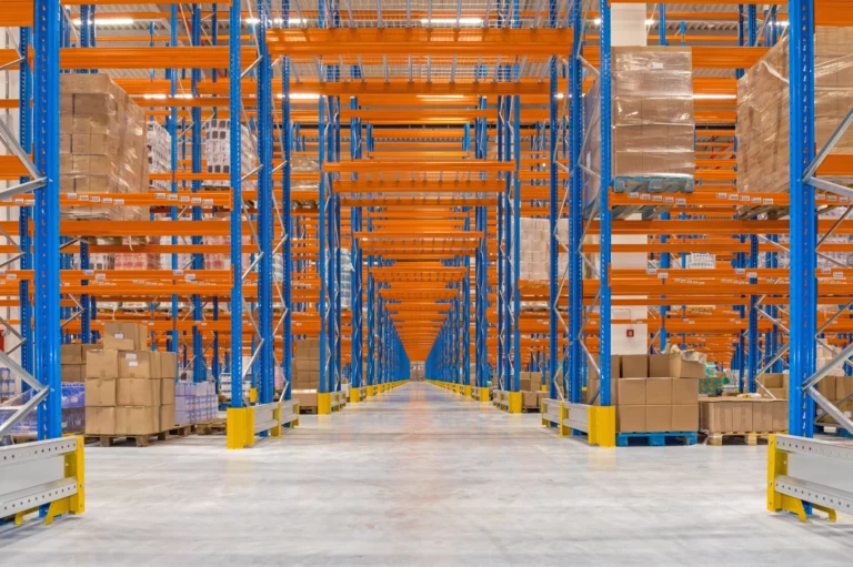 An efficient warehouse uses handheld scanners and organized shelving to speed up pick-and-pack operations.