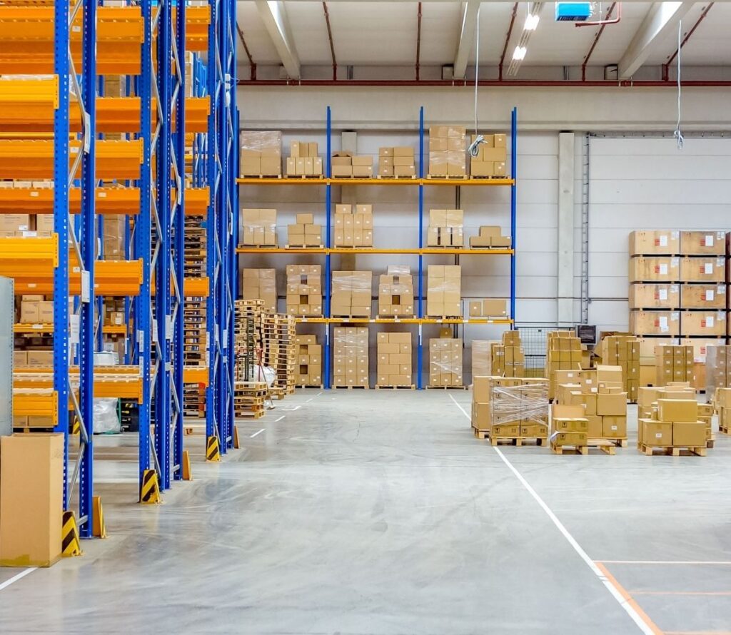 Inventory being efficiently managed in a modern logistics warehouse.