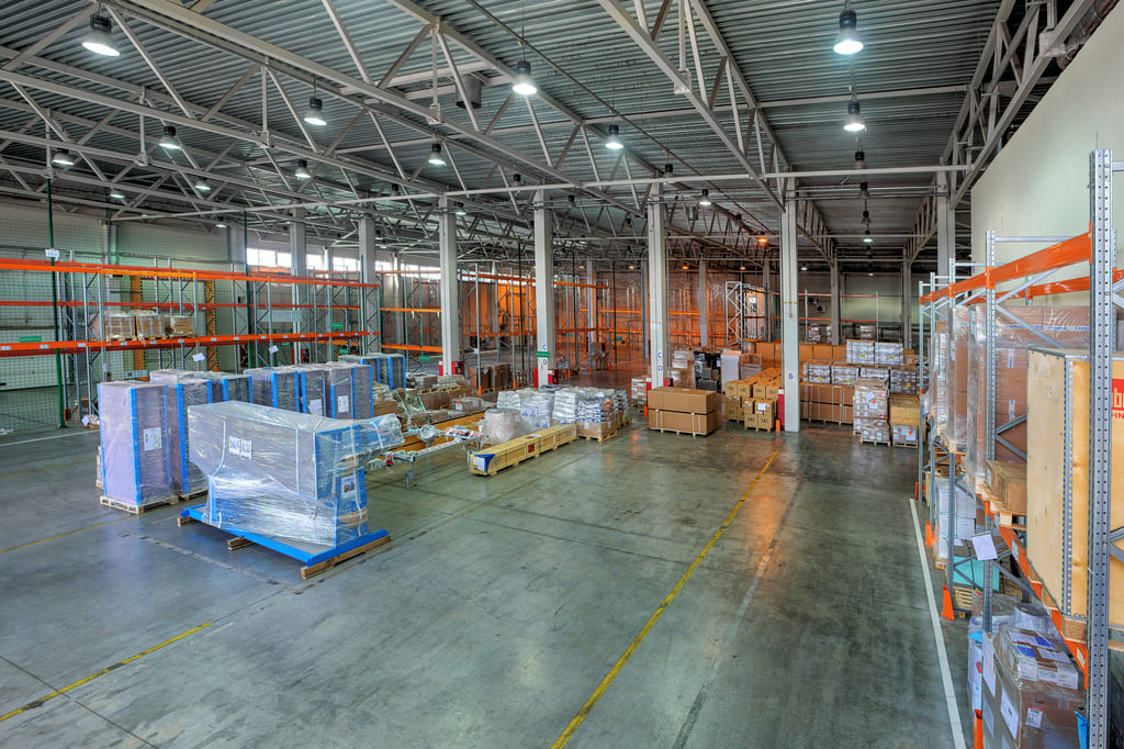 Secure customs warehouse facility storing imported goods under customs control before duty payment.