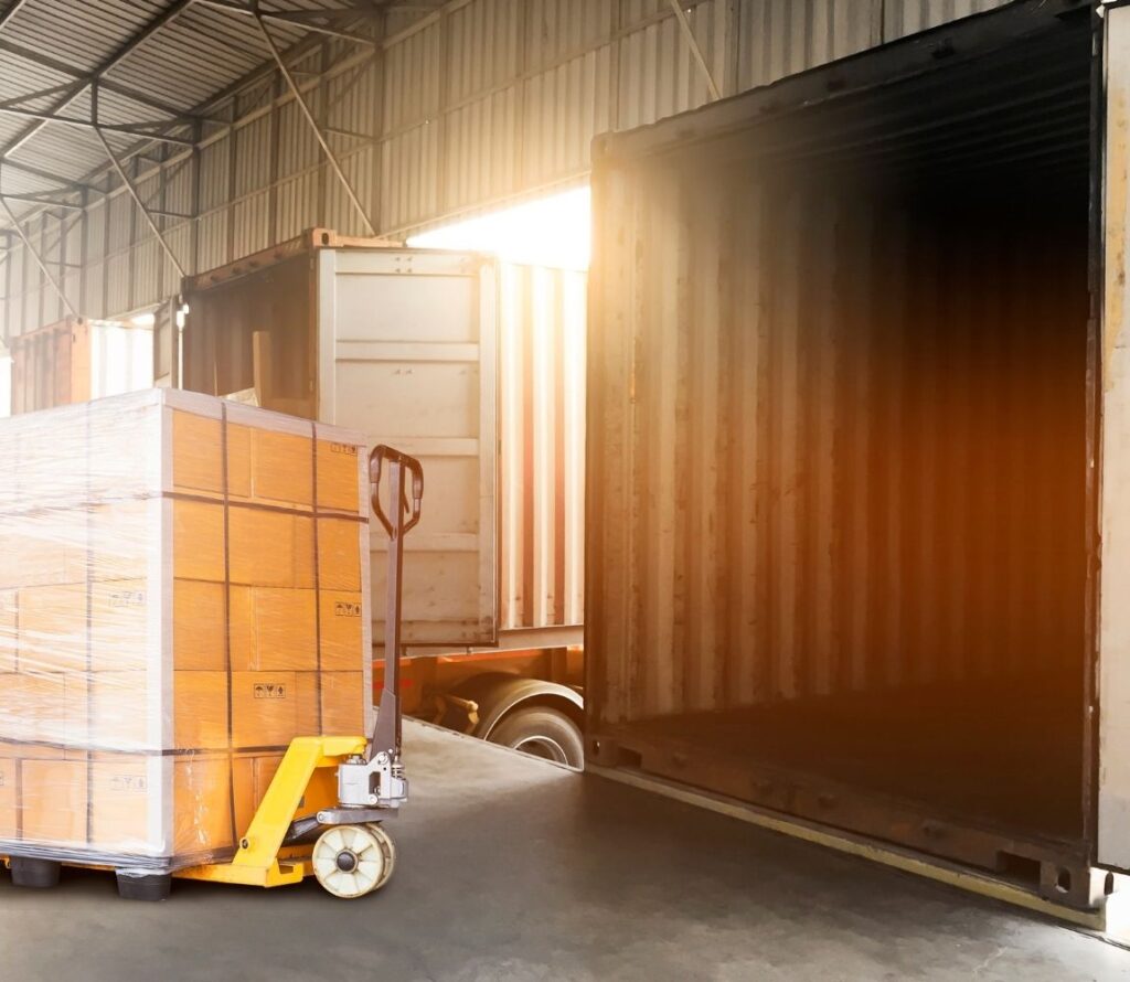 Cross-docking operation in progress at a Seattle logistics center, preparing goods for last mile delivery.