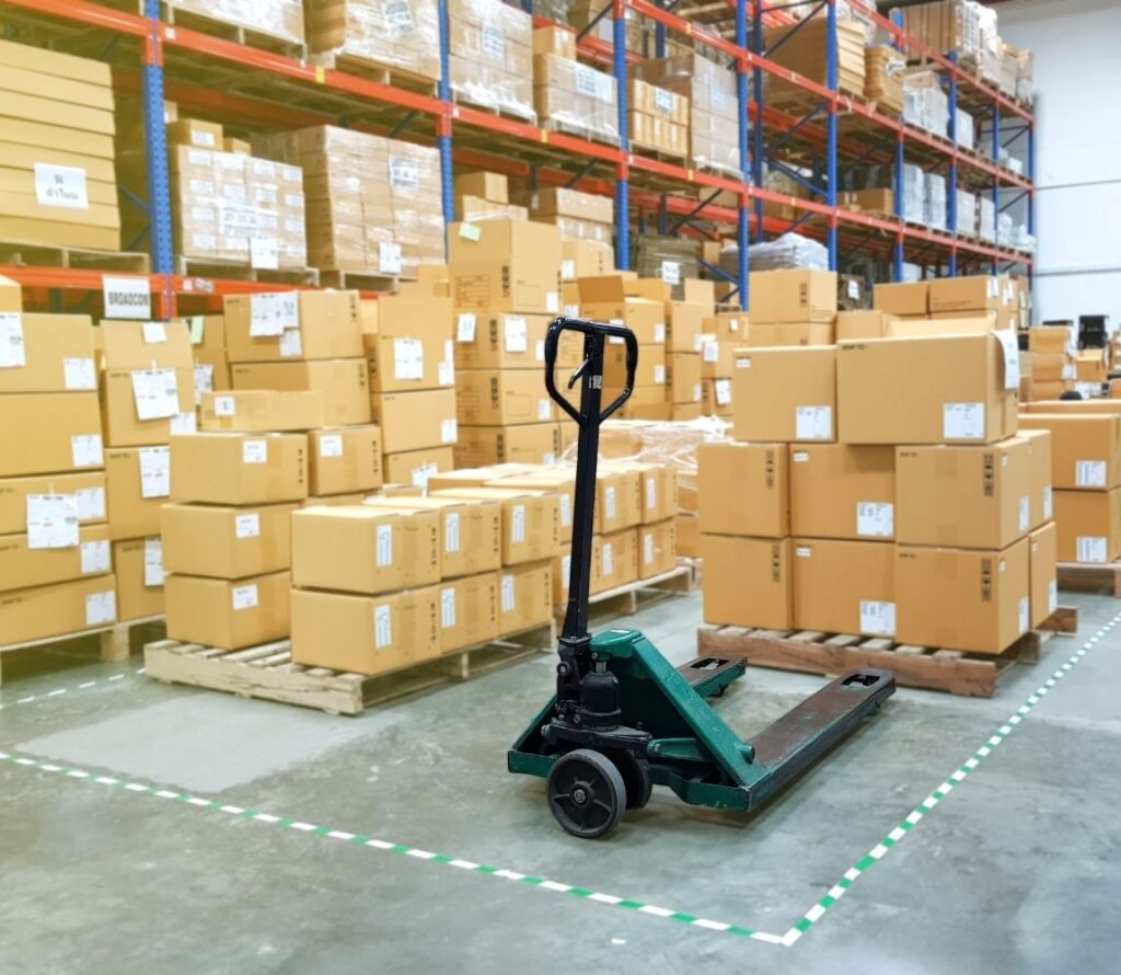 OLIMP Warehousing staff securing shifted pallets in Regina