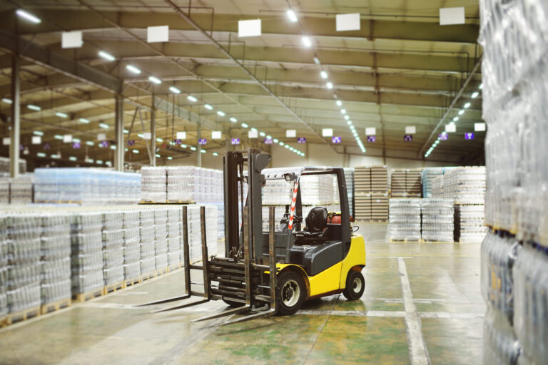 Temperature-controlled food warehouse with organized pallet racks of packaged goods
