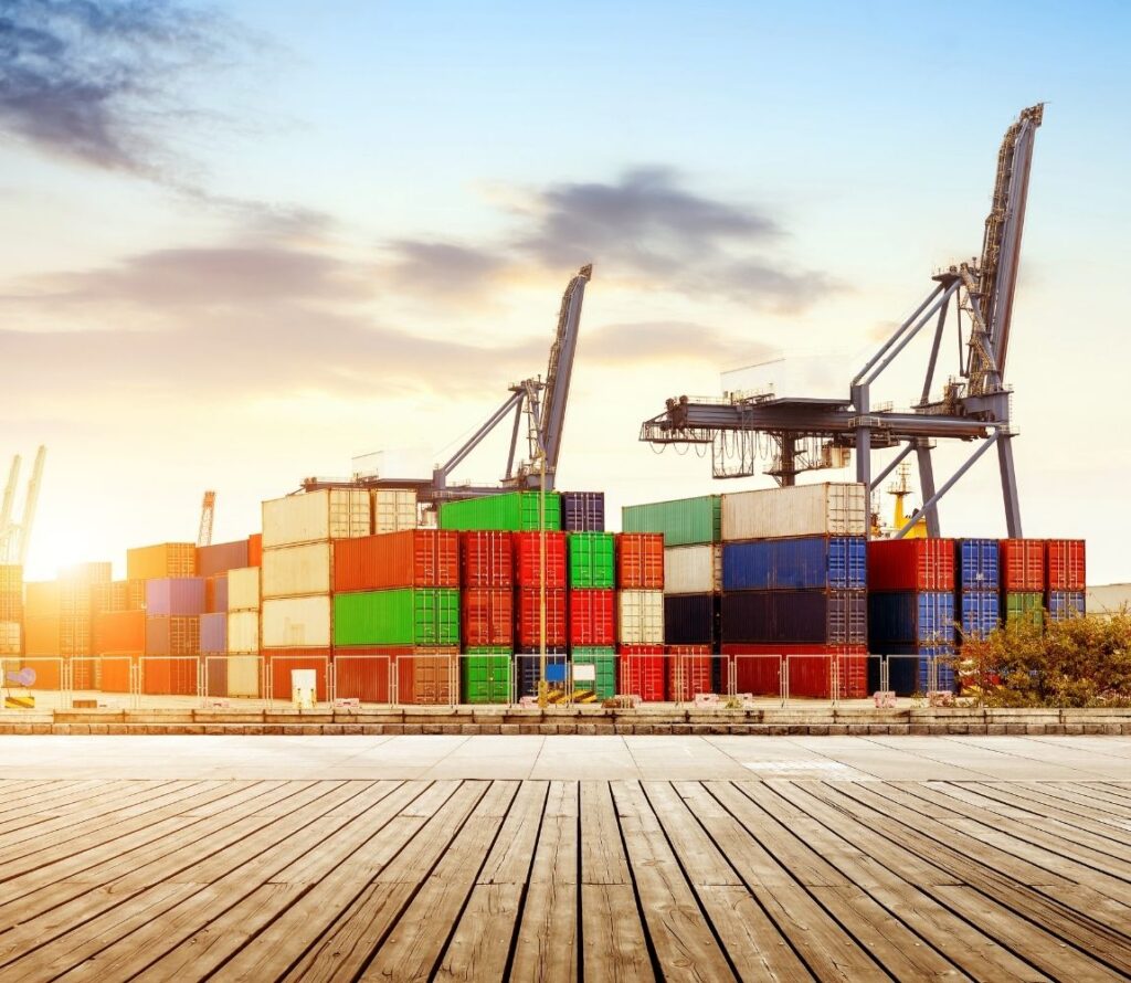 Forklift moving cargo containers during transloading and drayage operations at OLIMP Warehousing Hopkinton, New Hampshire.