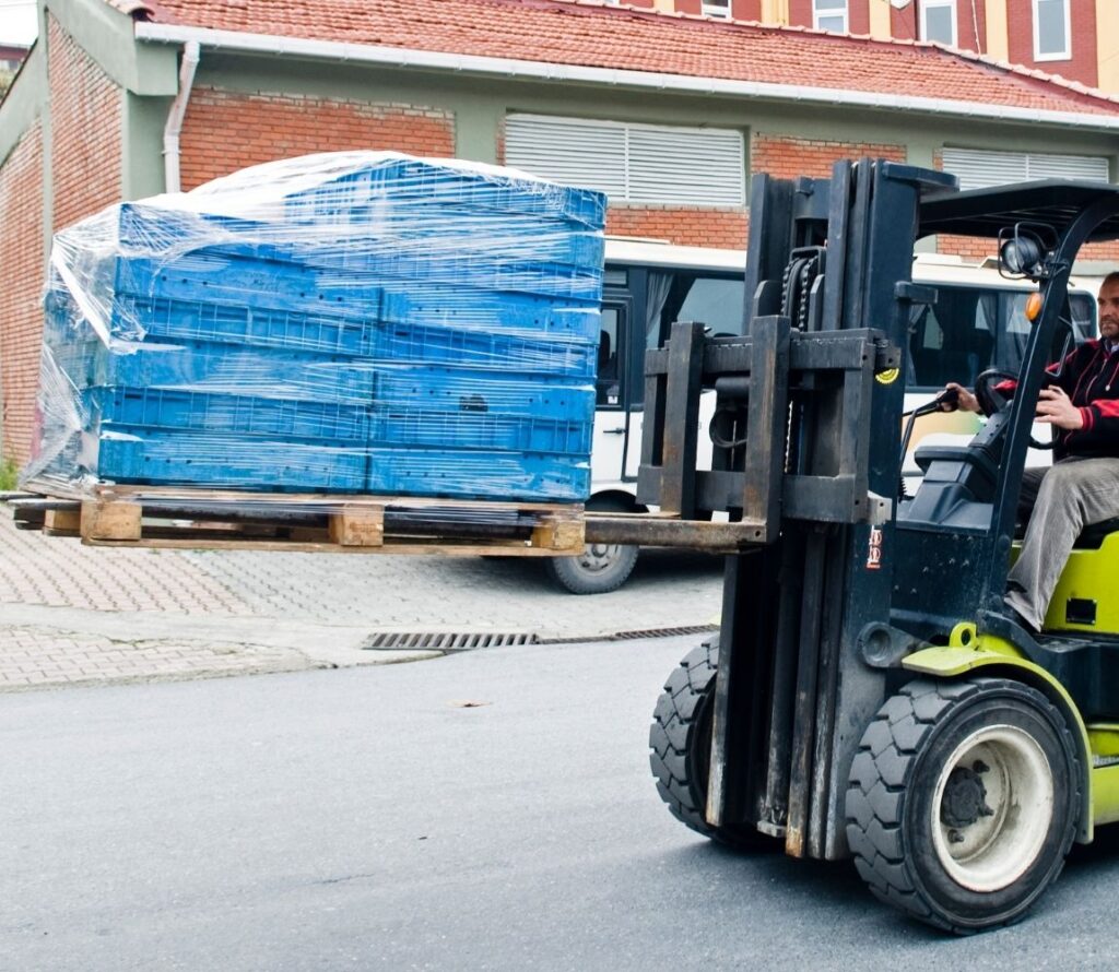 Pallet rework services at OLIMP Montgomery ensure safer, more efficient shipments through expert restacking, repositioning, and stabilization.