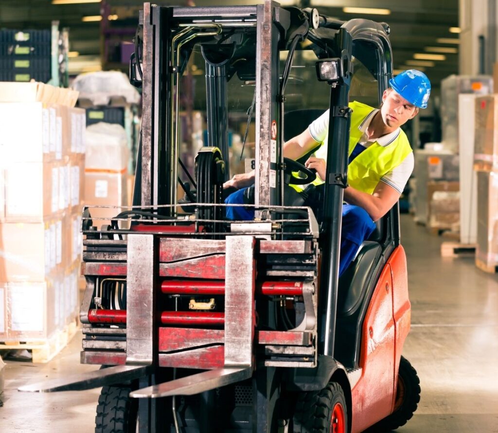 Cross docking operations in York PA warehouse with inbound and outbound freight trucks.