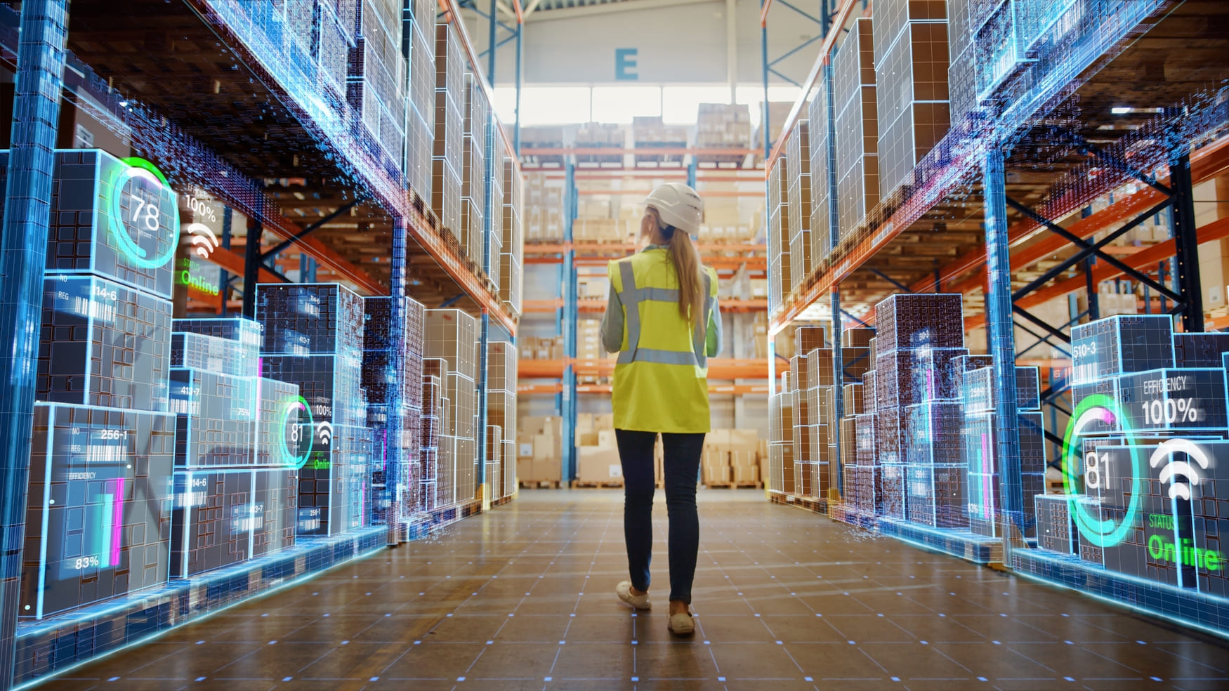 Worker in a smart warehouse with digital inventory systems and analytics, representing the future of retail logistics.
