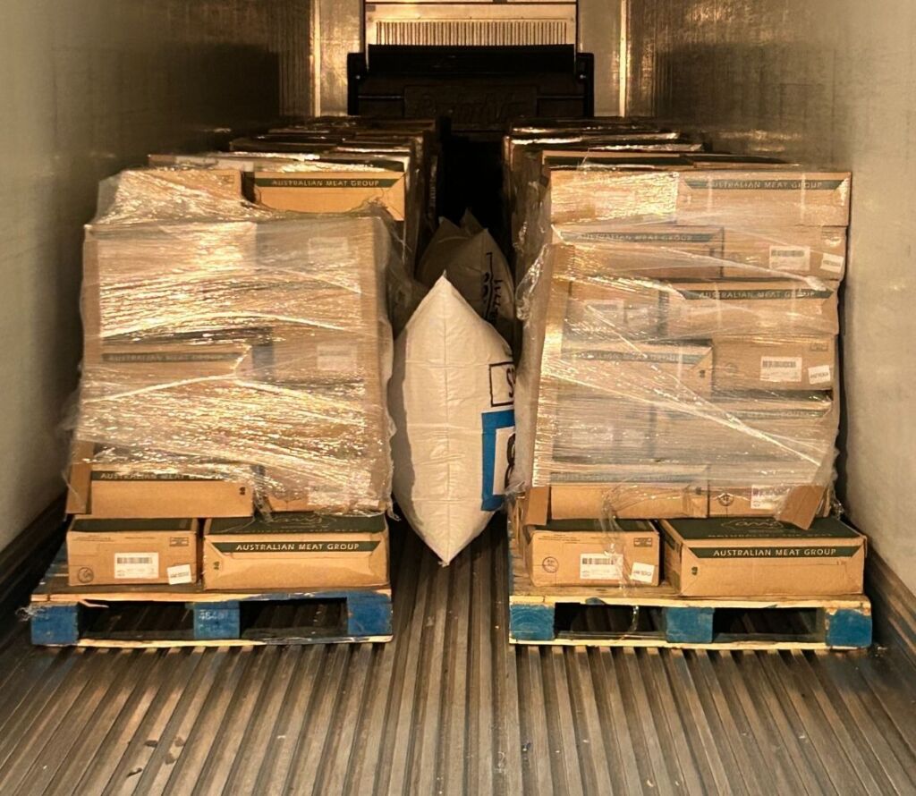 Professionally reworked pallets maximizing warehouse space and protecting inventory.