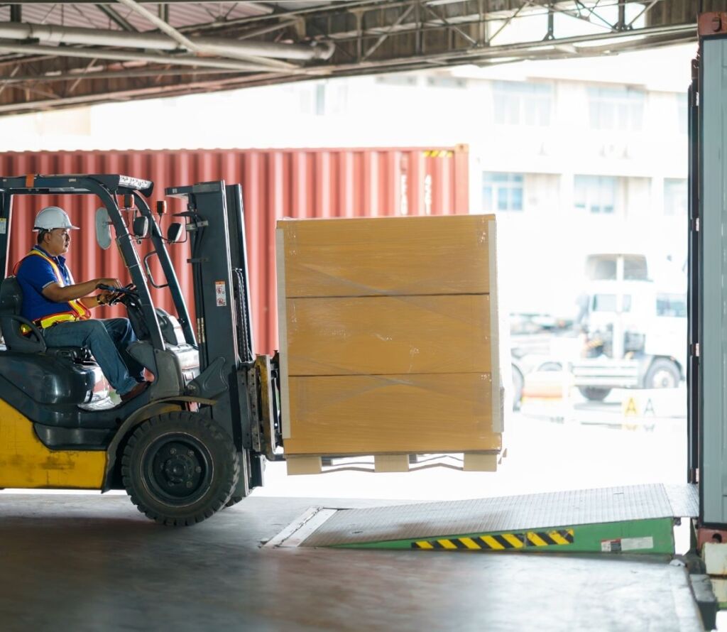 Cross docking logistics process showing fast transfer between trucks and warehouse