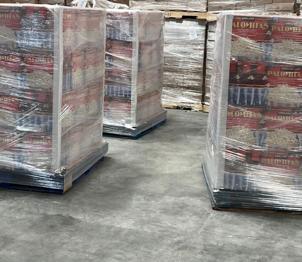 Pallet restacking and pallet rework solutions for warehouses and distribution centers